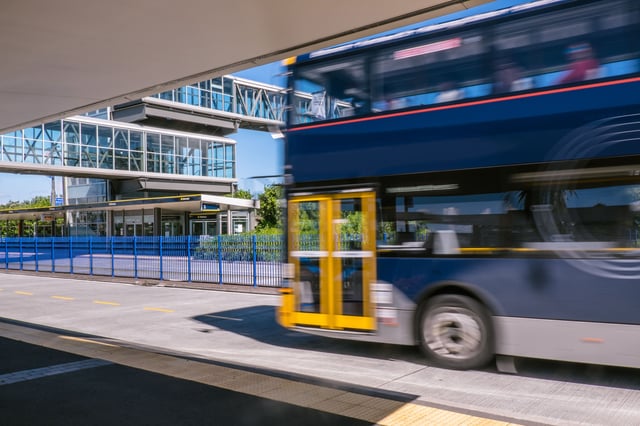 A bus at a park and ride transport station busway on North Shore, New Zealand.