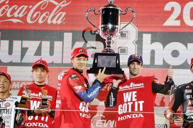 Takumi Takahashi (center) and Johann Zarco (right) on the podium
