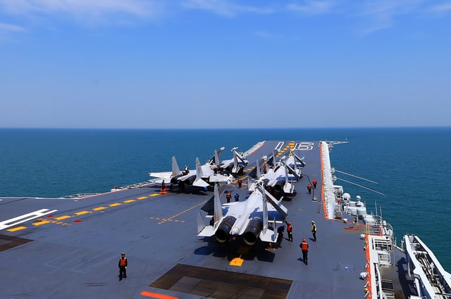 This illustrative image from April 24, 2018 shows J15 fighter jets on China&#39;s aircraft carrier, the Liaoning, during a drill at sea.