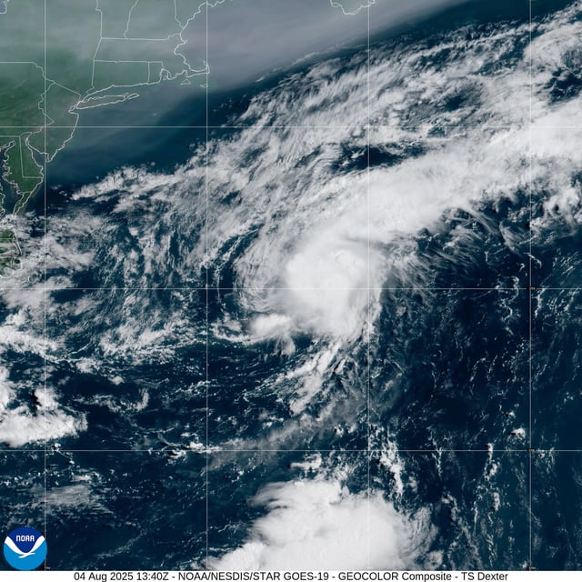 Tropical Storm Dexter is seen as a spiraling cluster of clouds in this weather satellite photo of the western Atlantic Ocean taken Monday morning.
