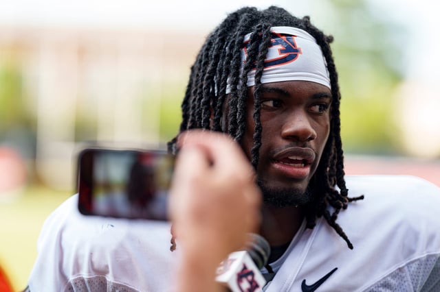 AUBURN, AL - July 31, 2025 - Auburn Defensive Back Kaleb Harris (#8) speaks to the media after a fall camp practice at the Woltosz Football Performance Center in Auburn, AL.