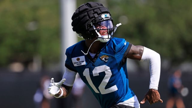 Jacksonville Jaguars wide receiver Travis Hunter (12) runs after an NFL training camp session at the Miller Electric Center, Sunday, Aug. 3, 2025, in Jacksonville, Fla. [Corey Perrine/Florida Times-Union]
