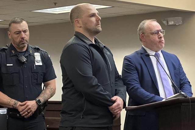 FILE - Correctional officer Christopher Walrath, center, appears in Oneida County Court, Monday, May 5, 2025, in Utica, N.Y., to enter a guilty plea for manslaughter in the December 2024 death of inmate Robert Brooks. (AP Photo/Michael Hill, file)
