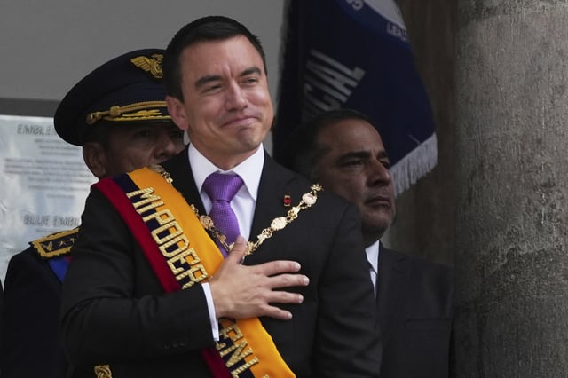 FILE - Ecuador's President Daniel Noboa acknowledges supporters from the balcony of the presidential palace after his swearing-in ceremony for a second term in Quito, Ecuador, May 24, 2025. (AP Photo/Carlos Noriega, File)