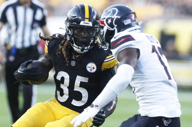 Aug 9, 2024; Pittsburgh, Pennsylvania, USA;  Pittsburgh Steelers running back Jonathan Ward (35) runs the ball as Houston Texans cornerback Kris Boyd (17) defends during the second quarter at Acrisure Stadium. Mandatory Credit: Charles LeClaire-USA TODAY Sports/File Photo