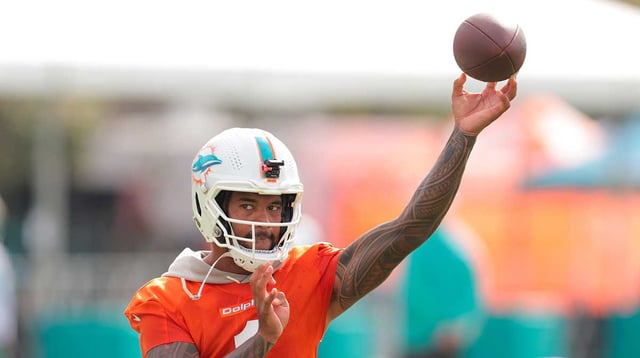 Jul 28, 2025; Miami Gardens, MI, USA; Miami Dolphins quarterback Tua Tagovailoa (1) throws the football during training camp at Baptist Health Training Complex. Mandatory Credit: Sam Navarro-Imagn Images