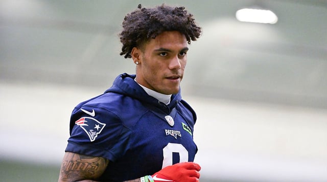 Jun 10, 2025; Foxborough, MA, USA; New England Patriots cornerback Christian Gonzalez (0) jogs to the sideline during minicamp held in the WIN Field House at Gillette Stadium. Mandatory Credit: Eric Canha-Imagn Images