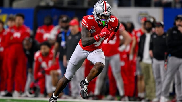 Ohio State Buckeyes wide receiver Jeremiah Smith (4) in action during the game between the Texas Longhorns and the Ohio State Buckeyes at AT&amp;T Stadium. Mandatory Credit: Jerome Miron-Imagn Images