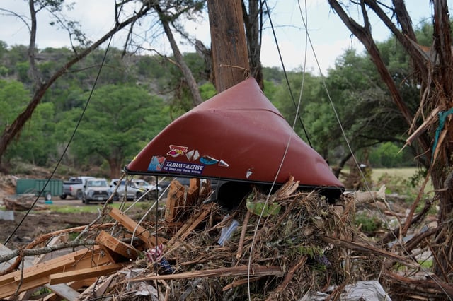 Debris covers the ground after the flood in Hunt, Texas, on July 4. Hunt is in western Kerr County. (ASHLEY LANDIS/AP)