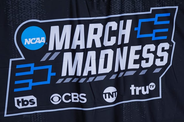 General views of the men's March Madness logo on the court during practice at State Farm Arena