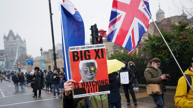 Protesters fearing interference from Beijing demonstrate against plans for a new Chinese embassy at Tower Hill, London
