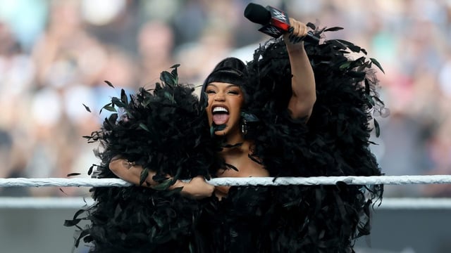 Cardi B in-ring welcoming the crowd at WWE SummerSlam 2025