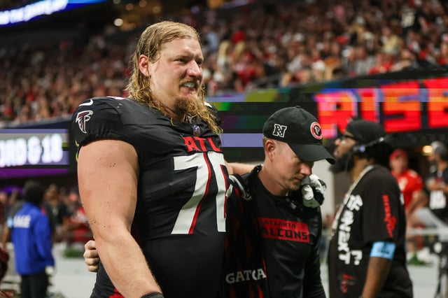 Sep 22, 2024; Atlanta, Georgia, USA; Atlanta Falcons offensive tackle Kaleb McGary (76) leaves the field with an injury against the Kansas City Chiefs in the second quarter at Mercedes-Benz Stadium. Mandatory Credit: Brett Davis-Imagn Images/File Photo