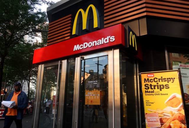 A person walks past a McDonald&#39;s restaurant on Broadway on June 11, 2025, in New York City.