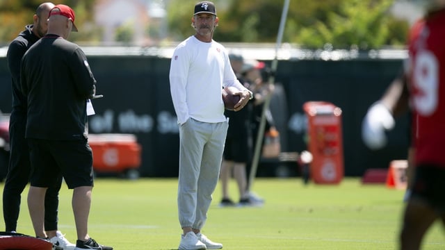 Jun 10, 2025; Santa Clara, CA, USA; San Francisco 49ers head coach Kyle Shanahan watches his players work out during an OTA at Levi&#39;s Stadium. Mandatory Credit: D. Ross Cameron-Imagn Images
