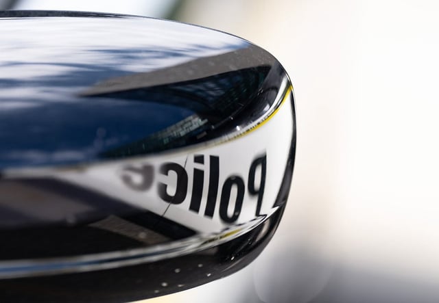 The word "police" is reflected on a Surete du Quebec vehicle in Montreal, Tuesday, Sept. 10, 2024. THE CANADIAN PRESS/Christinne Muschi