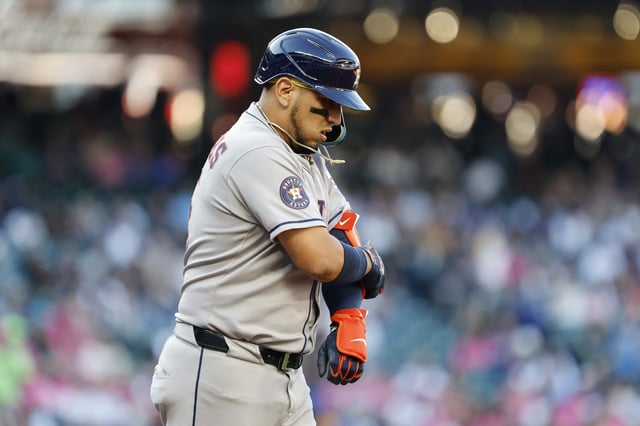 SEATTLE, WASHINGTON - JULY 18: Isaac Paredes #15 of the Houston Astros takes base on balls during the first inning against the Seattle Mariners at T-Mobile Park on July 18, 2025 in Seattle, Washington.