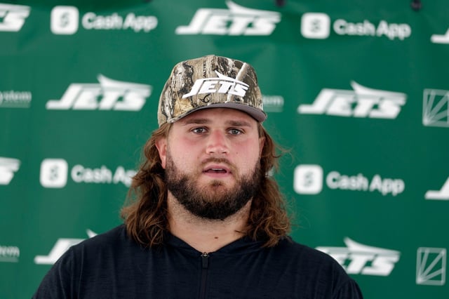 New York Jets center Joe Tippmann speaks to the media at the team&#39;s NFL football training camp, Wednesday, July 23, 2025, in Florham Park, N.J. (AP Photo/Adam Hunger)