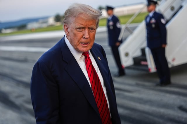 President Donald Trump speaks with reporters before boarding Air Force One at Lehigh Valley International Airport, Sunday, Aug. 3, 2025, in Allentown, Pa.