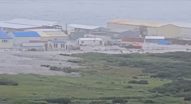A powerful wave washes past a building located near the shore, after a powerful earthquake struck off the Kamchatka Peninsula, in Severo-Kurilsk, Sakhalin Region, Russia July 30, 2025 in this screen grab obtained from social media video Social media/via REUTERS/File Photo