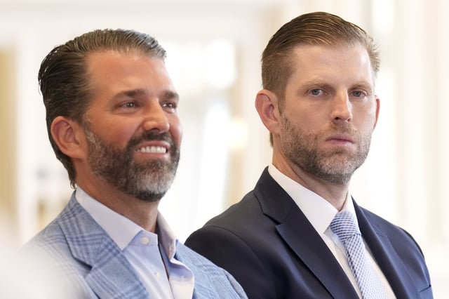 Donald Trump Jr. and Eric Trump attend the meeting between President Donald Trump and European Commission President Ursula von der Leyen at the Trump Turnberry golf course in Turnberry, Scotland Sunday, July 27, 2025. (AP Photo/Jacquelyn Martin)