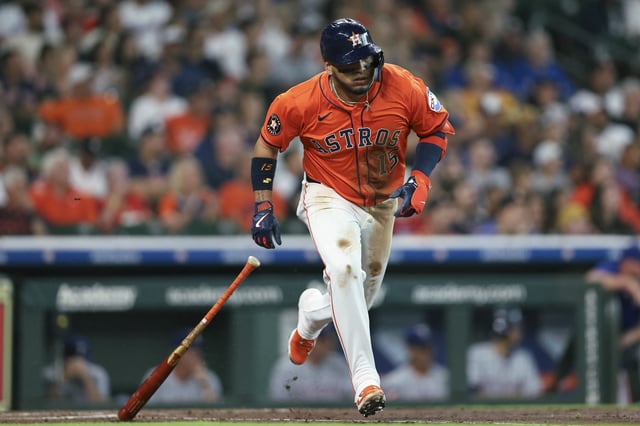 Jul 11, 2025; Houston, Texas, USA; Houston Astros third baseman Isaac Paredes (15) hits a single during the first inning against the Texas Rangers at Daikin Park. Mandatory Credit: Troy Taormina-Imagn Images/File Photo