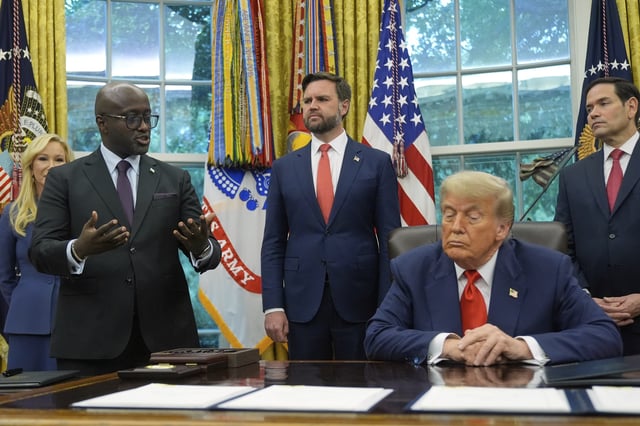 President Donald Trump listens as Rwanda's Foreign Minister Olivier Nduhungirehe speaks during a event with Congo's Foreign Minister Therese Kayikwamba Wagner, Friday, June 27, 2025, in the Oval Office at the White House in Washington, as Vice President JD Vance and Secretary of State Marco Rubio, watch. (AP Photo/Manuel Balce Ceneta)
