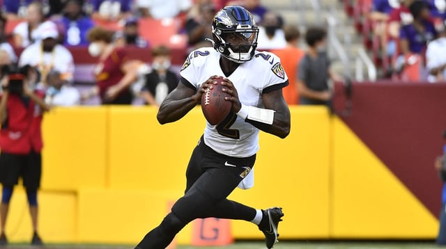 Aug 28, 2021; Landover, Maryland, USA; Baltimore Ravens quarterback Tyler Huntley (2) rolls out against the Washington Football Team during the first quarter at FedExField. Mandatory Credit: Brad Mills-Imagn Images.