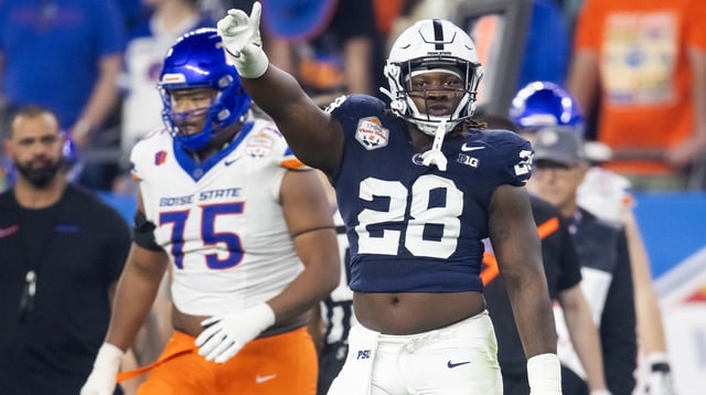 Dec 31, 2024; Glendale, AZ, USA; Penn State Nittany Lions defensive tackle Zane Durant (28) celebrates a play against the Boise State Broncos during the Fiesta Bowl at State Farm Stadium. Mandatory Credit: Mark J. Rebilas-Imagn Images