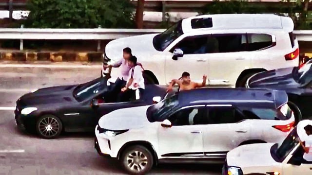 Two other men are seen recording videos, while other members of the group cheered from adjoining vehicles, some of them standing on footrests and others coming out of the sunroofs. The cars had illegally installed sirens, which were blared continuously, the residents alleged. (HT PHOTO)