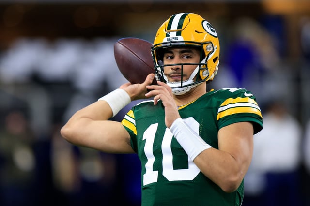 Jordan Love #10 of the Green Bay Packers participates in warmups prior to the NFC Wild Card Playoffs against the Dallas Cowboys at AT&amp;T Stadium on January 14, 2024 in Arlington, Texas.
