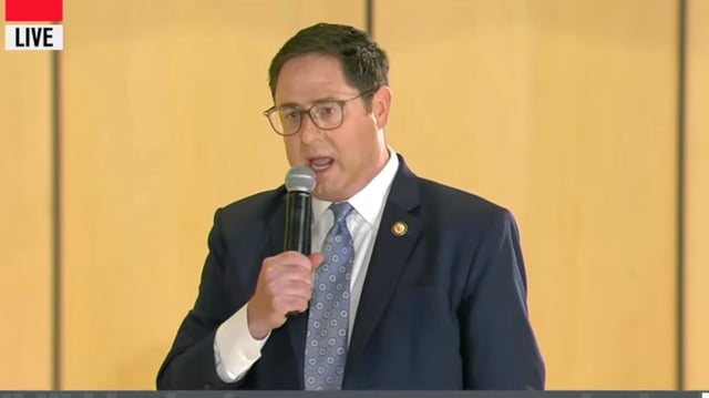 Republican Mike Flood addresses a Town Hall meeting in Nebraska.