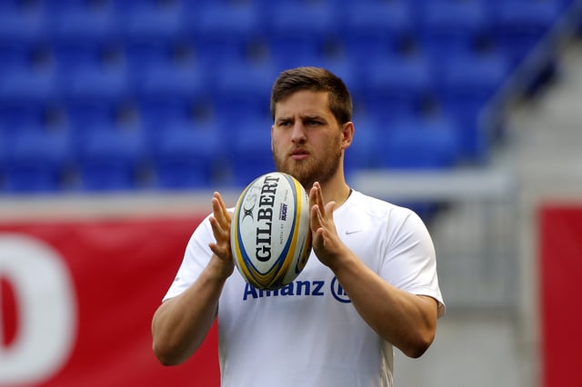 Rugby player Dave Porecki of Saracens spins a ball during a team practice at Red Bull Arena in Harrison, New Jersey, March 11, 2016. Saracens will face London Irish March 12 at Red Bull Arena in the first ever English Premiership game in the United States.  REUTERS/Mike Segar/File Photo