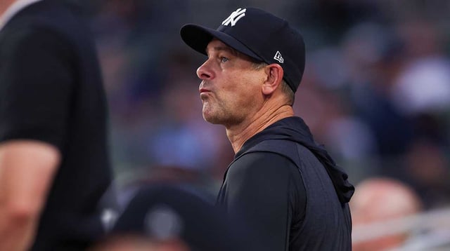 Jul 19, 2025; Atlanta, Georgia, USA; New York Yankees manager Aaron Boone (17) in the dugout against the Atlanta Braves in the fifth inning at Truist Park. Mandatory Credit: Brett Davis-Imagn Images