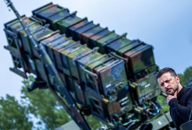 Ukrainian President Volodymyr Zelensky stood next to a US Patriot air missile defence system
