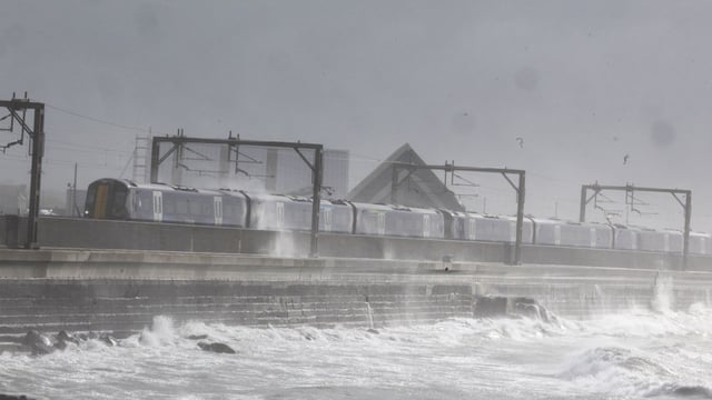 Waves lash the sea wall at Saltcoats station in North Ayrshire on Monday morning