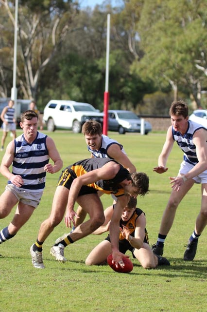 BSR's Jackson Lee attempts to gain the contested ground ball against Blyth-Snowtown. (Bronwyn Mumford)