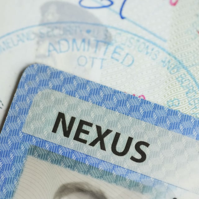 A NEXUS card and a Canadian passport are pictured in Ottawa on Tuesday, Jan. 17, 2023. A New York congressman wants to add some Zoom to the sluggish effort to clear a bilateral backlog of Nexus trusted-traveller applications. THE CANADIAN PRESS/Sean Kilpatrick