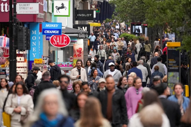 People walk on Oxford Street in London, Britain, May 15, 2025. REUTERS/Maja Smiejkowska/File Photo