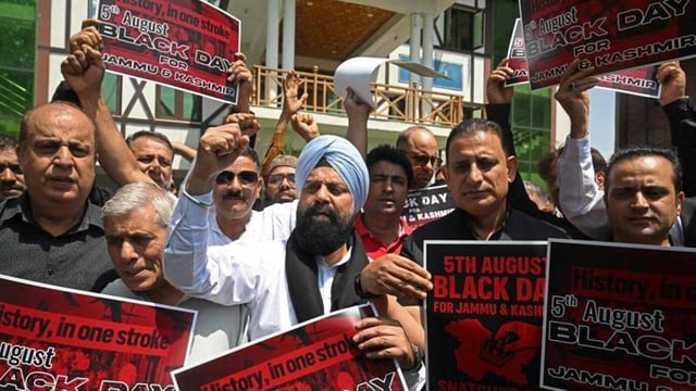 Congress supporters demanding the restoration of statehood in Jammu and Kashmir during a protest in Srinagar on Tuesday. (AFP Photo)