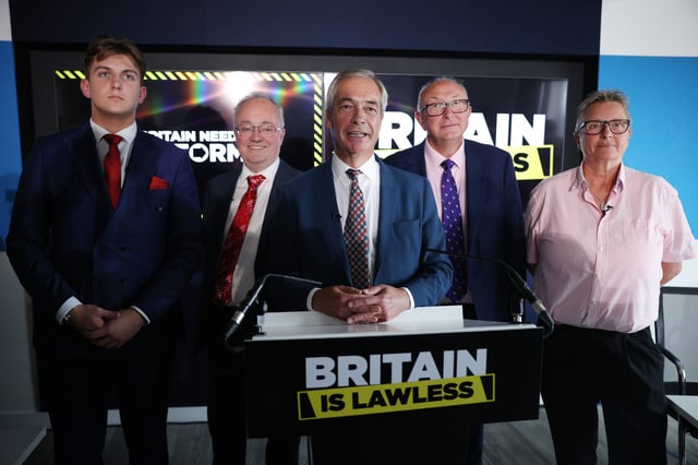 LONDON, ENGLAND - AUGUST 4:  (L-R) Reform UK councillor George Finch, Leicestershire Police and Crime Commissioner Rupert Matthews, Reform UK Leader Nigel Farage and Former head of security at HMP Wormwood Scrubs, Vanessa Frake (R) attend a press conference on law and order on August 4, 2025 in London, England. Nigel Farage continues to hold weekly press conferences introducing  Reform UK policies. Today, he promises that a future Reform UK government would immediately detain and deport migrants who arrive in the UK via small boat. He also introduces the party&#39;s new prison Czar, Vanessa Frake, a former prison governor who oversaw the detention of prolific serial killers like Rose West and Myra Hindley. (Photo by Dan Kitwood/Getty Images)