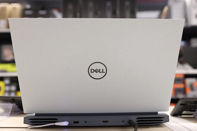 A Dell laptop is seen for sale in a store in Manhattan, New York City, U.S., November 24, 2021. REUTERS/Andrew Kelly/File Photo