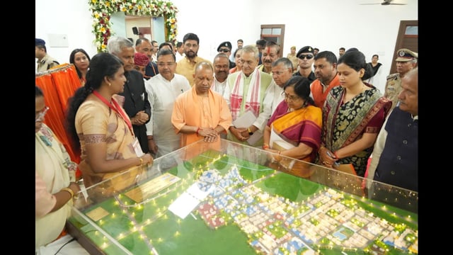 Chief minister Yogi Adityanath having a look at the model of the township in Agra. (Sourced)