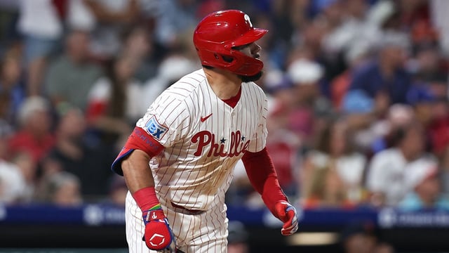 Aug 3, 2025; Philadelphia, Pennsylvania, USA; Philadelphia Phillies outfielder Kyle Schwarber (12) hits a home run during the eighth inning against the Detroit Tigers at Citizens Bank Park. Mandatory Credit: Bill Streicher-Imagn Images