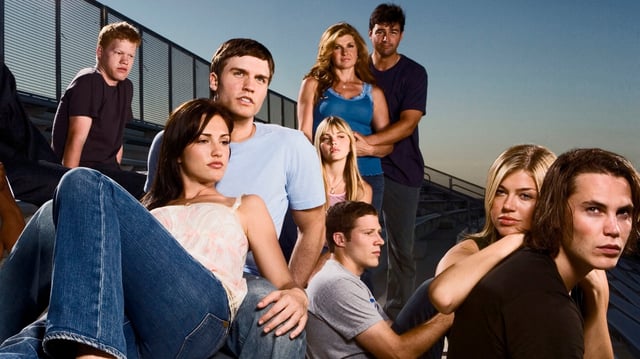 Friday Night Lights Cast Pictured: (l-r) Gaius Charles as Brian &#34;Smash&#34; Williams, Jesse Plemons as Landry Clarke, Minka Kelly as Lyla Garrity, Scott Porter as Jason Street, Aimee Teegarden as Julie Taylor, Connie Britton as Tami Taylor, Kyle Chandler as Eric Taylor, Zach Gilford as Matt Saracen, Adrianne Palicki as Tyra Collette, Taylor Kitsch as Tim Riggins.