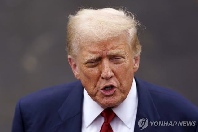 This photo, released by EPA, shows U.S. President Donald Trump speaking to the media before heading to Marine One as he leaves the White House in Washington on Aug. 1, 2025. (Yonhap)