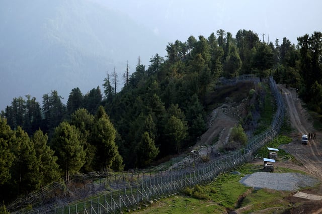 Fencing along the Line of Control (LoC) between India and Pakistan is pictured during a tour organised by the Indian Army for visiting journalists in north of Indian Kashmir, May 19, 2025. REUTERS/Sharafat Ali/File Photo