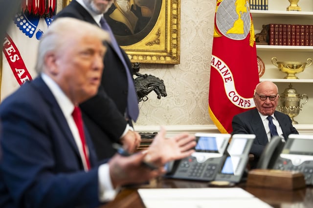 Media mogul Rupert Murdoch looks on as President Donald Trump speaks to members of the media as he signs proclamations, initiatives and appointments inside the Oval Office at the White House in Washington, D.C., on February 03, 2025. 