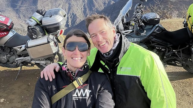 A handout photograph released in London on August 4, 2025 by the family of Craig and Lindsay Foreman, shows the couple while on their around-the-world motorbike trip