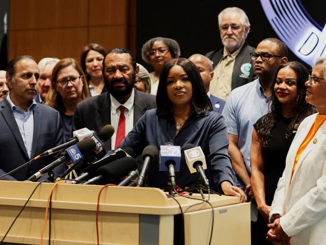 U.S. Rep. Jasmine Crockett (D-TX) looks on during a press conference held by Texas Democratic lawmakers after leaving the state to deny Republicans the quorum needed to redraw Texas' 38 congressional districts, in Warrenville, Illinois, U.S., August 4, 2025.  REUTERS/Tom Krawczyk